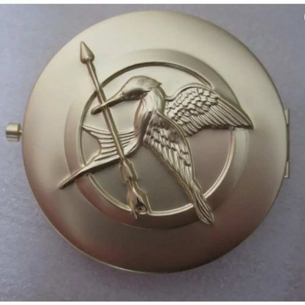 NIB Storybook Cos Girl On Fire Hunger Games Pressed Powder